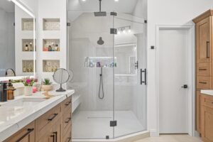 Modern Bathroom Remodel in Houston with Glass Shower and Custom Cabinets